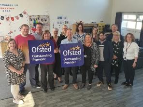 Liberty House staff celebrating the Outstanding Ofsted inspection report