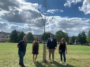 From left to right, Trees and Woodland Engagement Officer Rebecca Dickinson, Councillor Charlotte Carter, Councillor Adam Carter and Neighbourhood Coordinator Mandy Ardron stood around a tree.