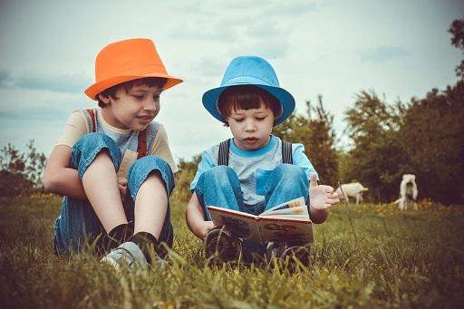 Children reading in the park