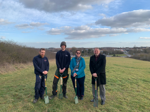 The image shows Councillor David Sheppard with staff from the Council’s Parks and Woodlands teams at the site of the new community woodland in Dinnington