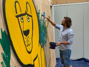 Ed Vere painting the Lion at Clifton Park Garden Room, taken by Louise Treloar, Grimm and Co