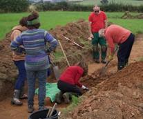 A group of people digging