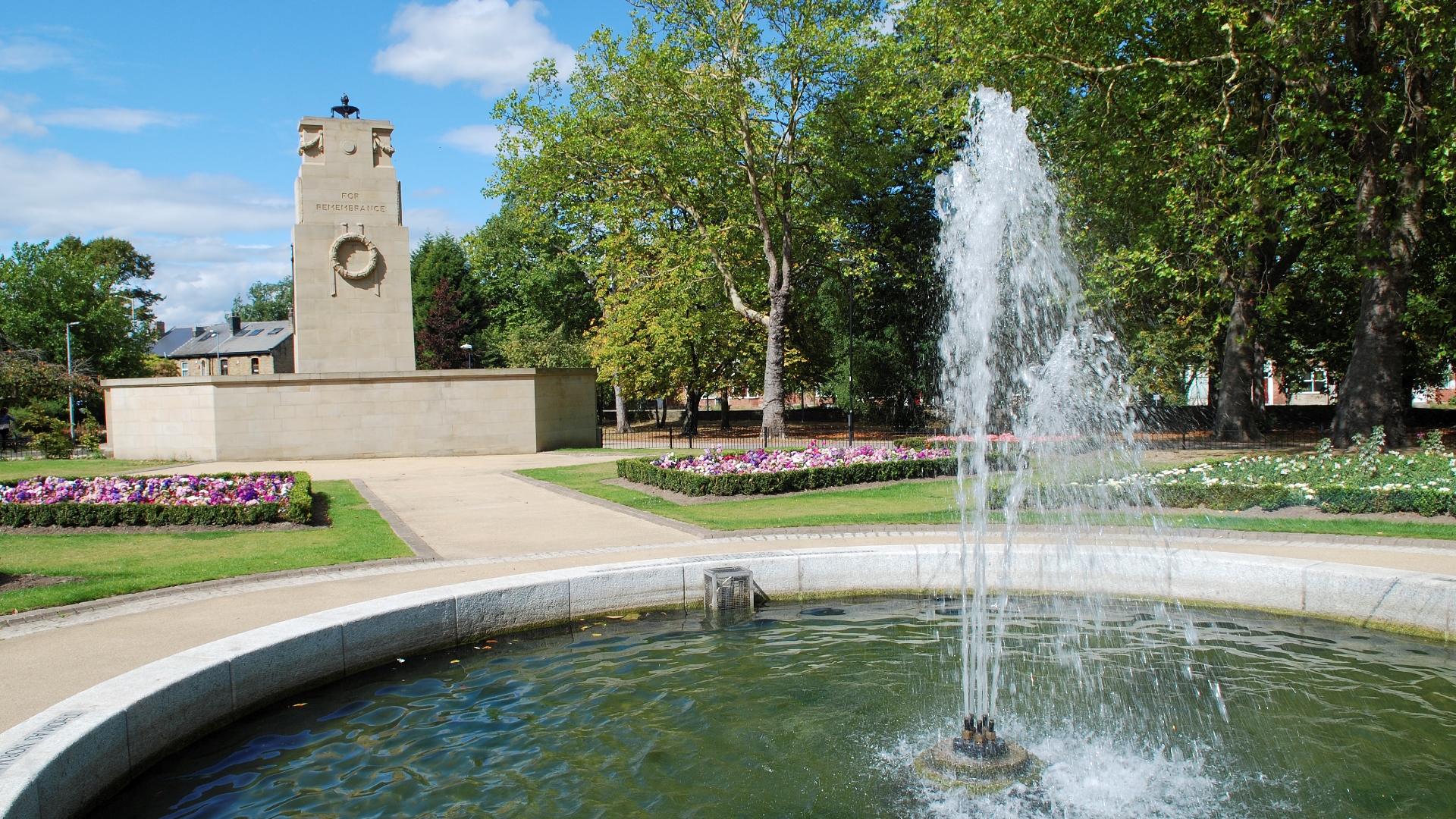 Clifton Park Memorian with water fountain in the foreground.