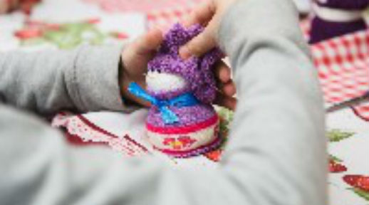 Close up of hands working on christmas decoration