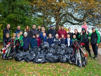 Junior football teams with litter collected