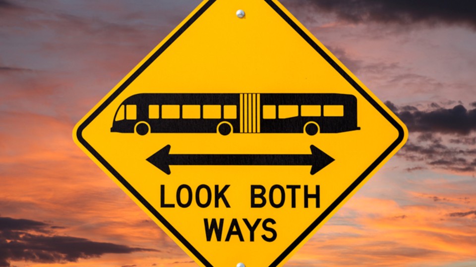 Road safety warning sign saying look both ways