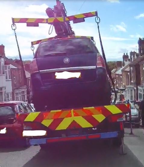 Towed Vauxhall Zafira on back of a lorry