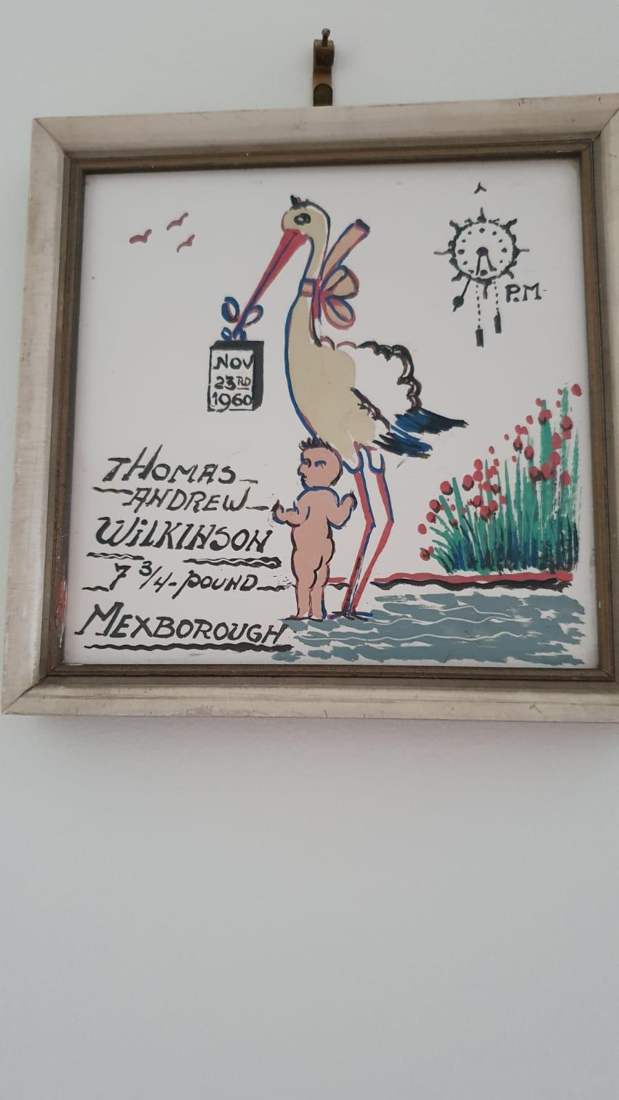 Painting showing a stork carrying a baby