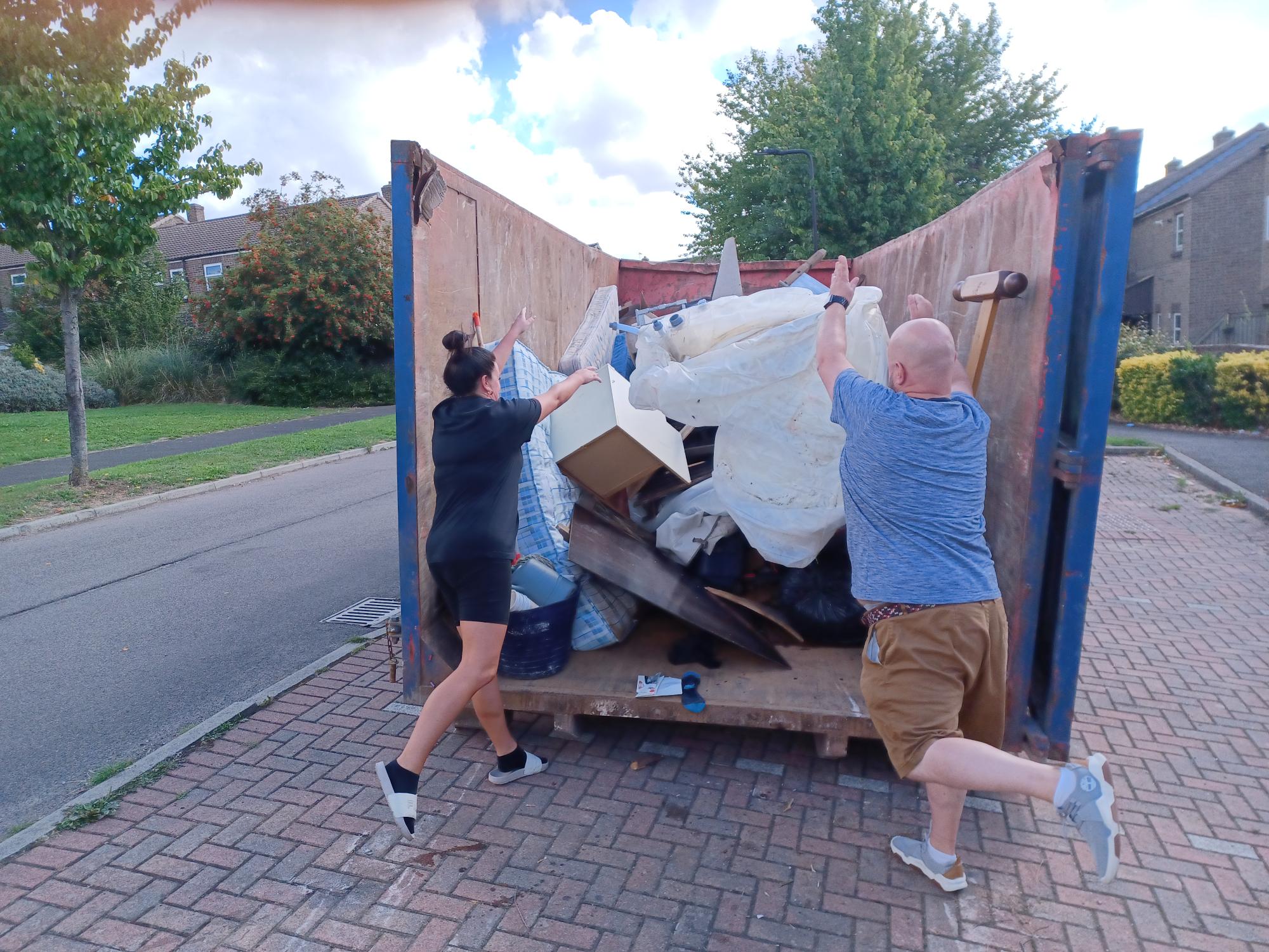 Items being thrown into the skip