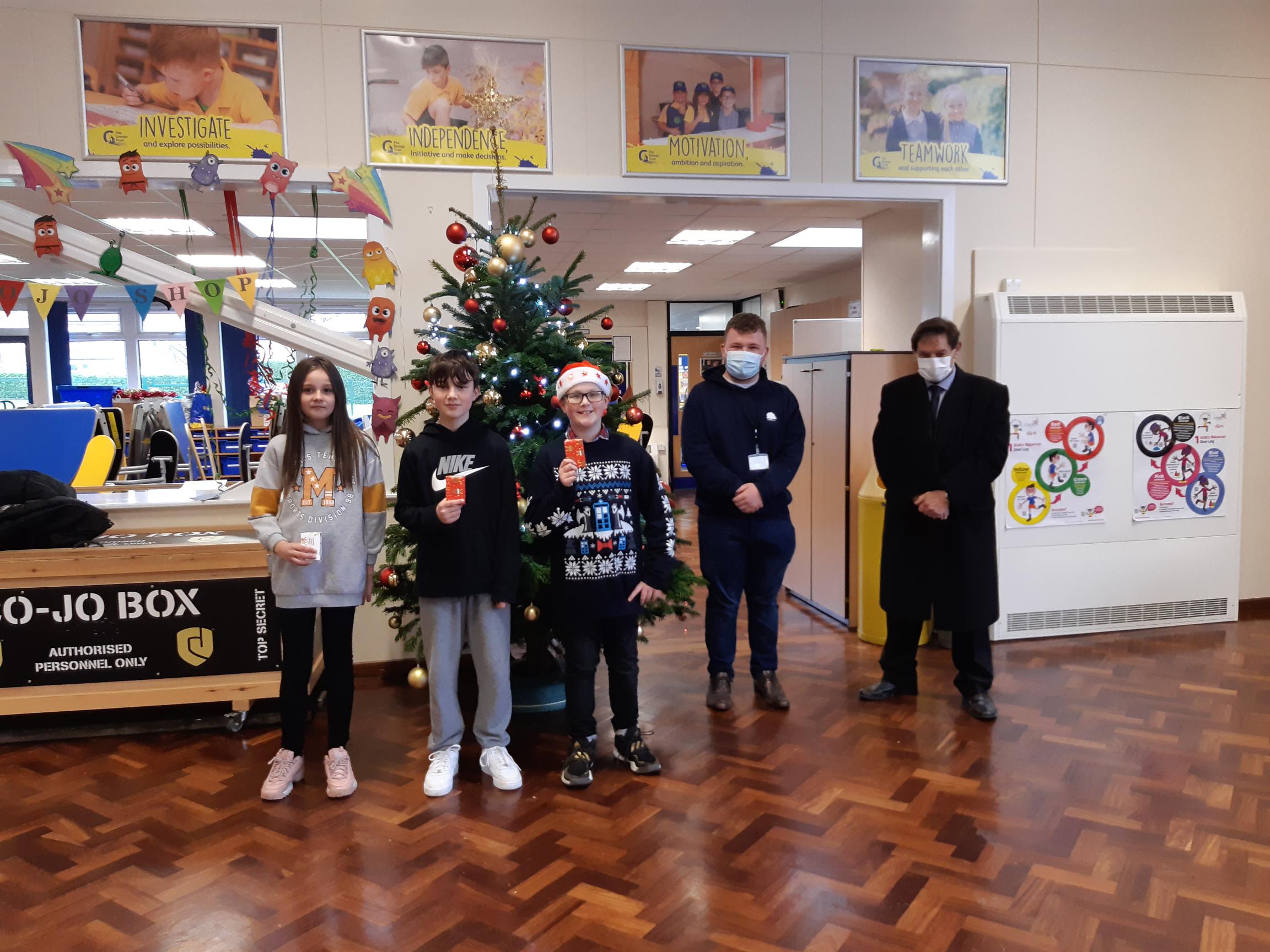 Councillors Mills and Reynolds with pupils at Bramley Grange School.