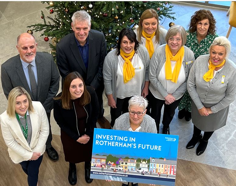 Council representatives, customers and partners come together to mark the opening.