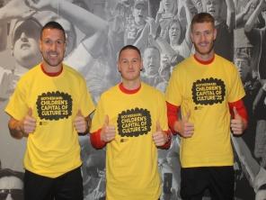 Richard Wood, Ben Wiles and Michael Smith of Rotherham United show their support for Children&#039;s Capital of Culture