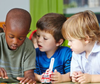 3 Children playing with toys.