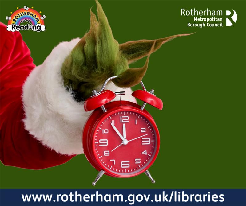 the grinch holding an alarm clock