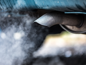 Car exhaust with fumes coming out of it