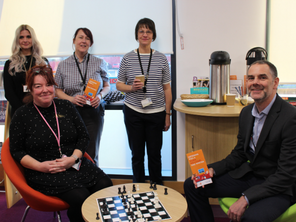 Ben Anderson with library staff at a warm welcome space