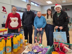 Rotherham Council's Leader, Cllr Chris Read, with Tony Robinson and Sunnyside Supplies volunteers.