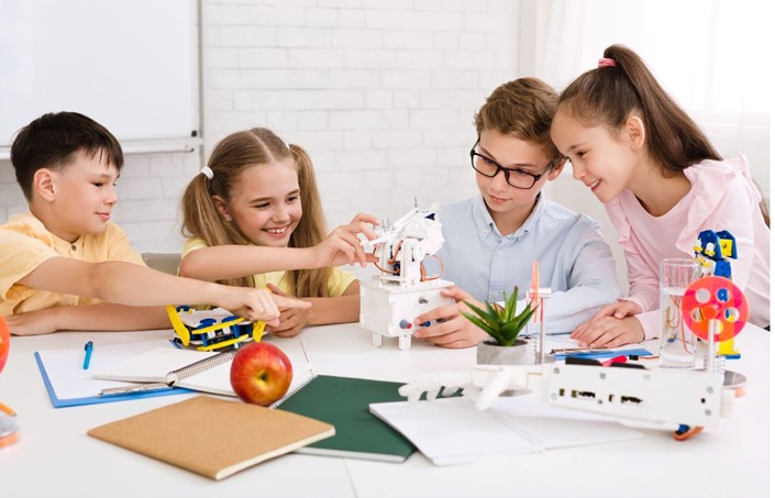 Children making something.