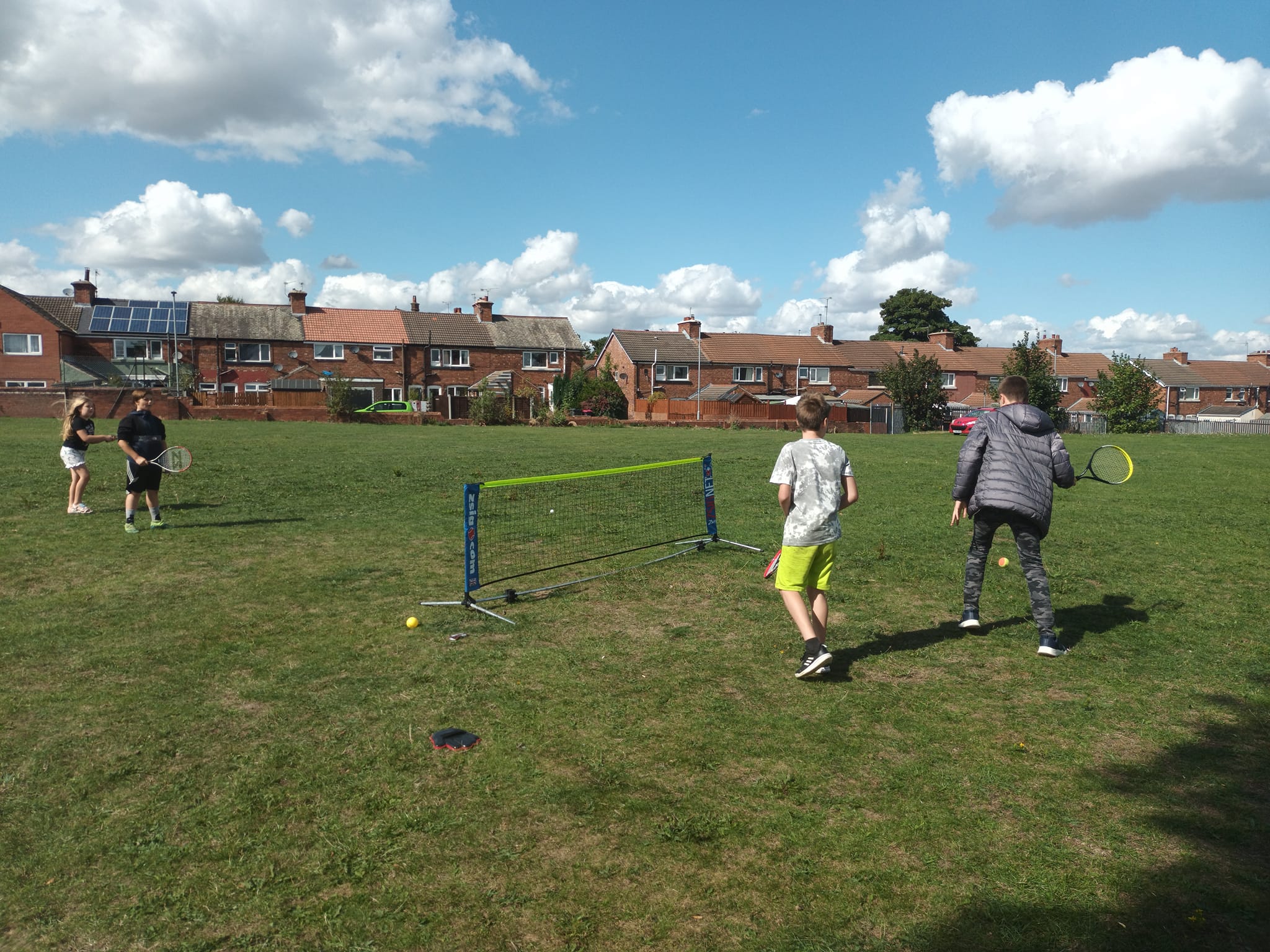 Children playing tennis