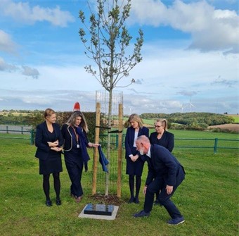 The plaque being unveiled