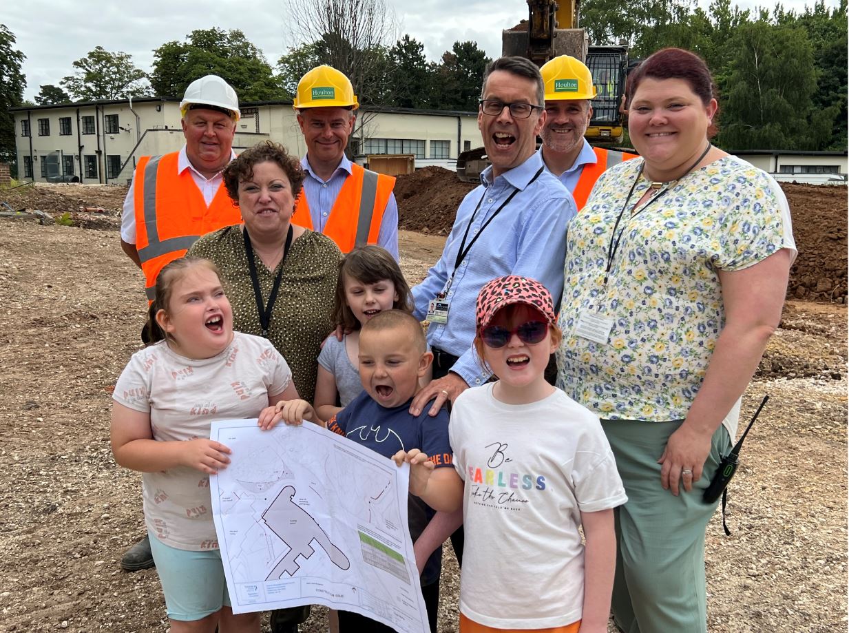 Headteacher Paul Silvestre, school staff, Cllr Cusworth and Houlton Construction staff.