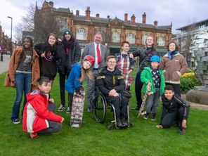 Cllr Sheppard and a group of children gathered in Rotherham