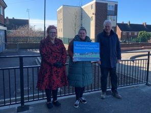 Ward Councillors Holding a Sign.