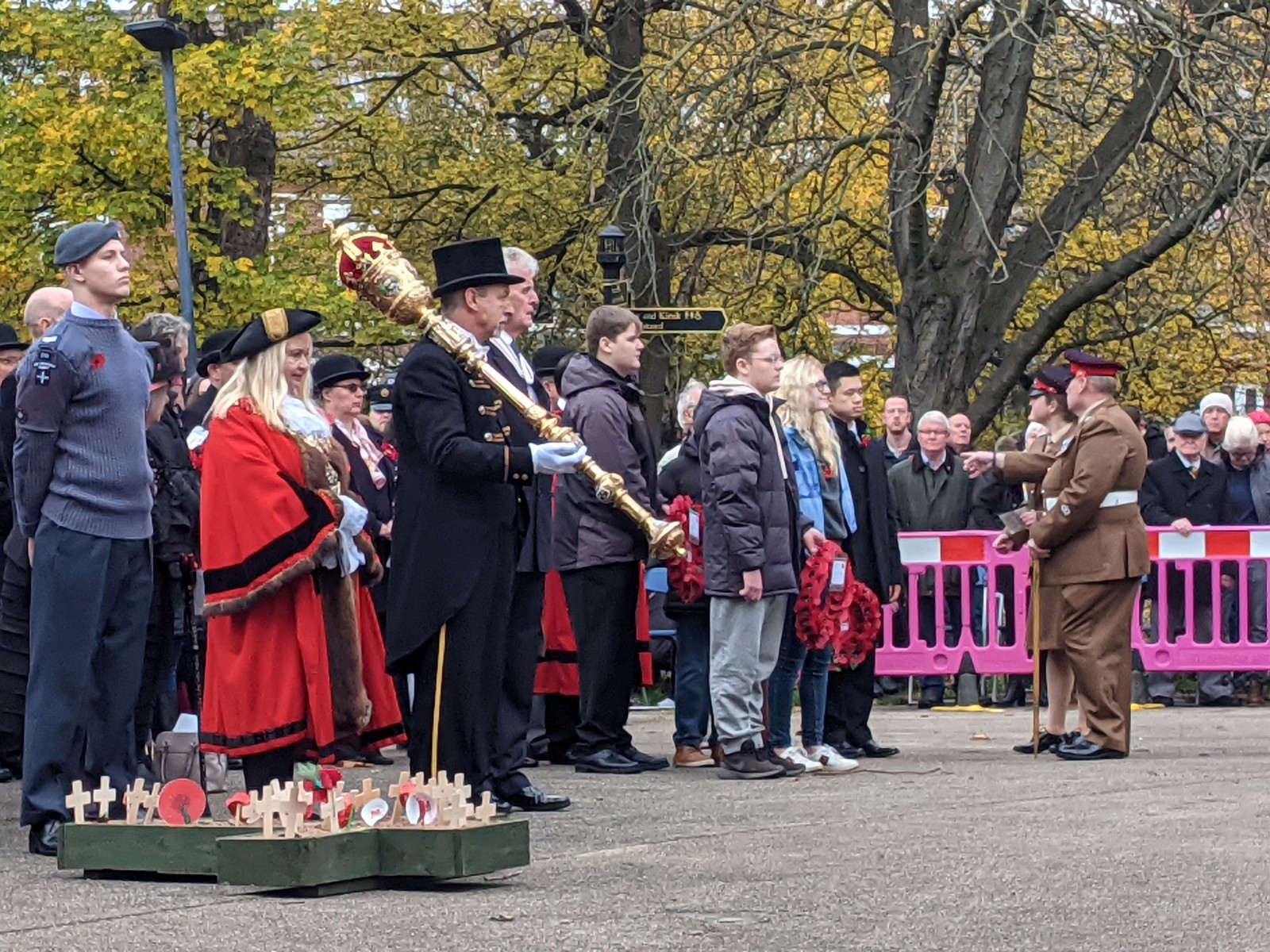 Members of Rotherham Youth Cabinet holding poppy wreaths alongside Mayor Jenny Andrews at the 2021 Rotherham remembers event