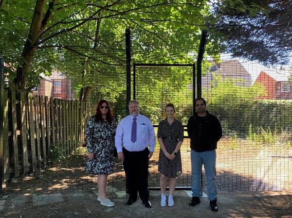 From left to right, the image shows Louise Igoe, Nigel Masters, Sophie Beresford and Councillor Tajamal Khan. The image was taken where some of the new fencing and gates have been installed.