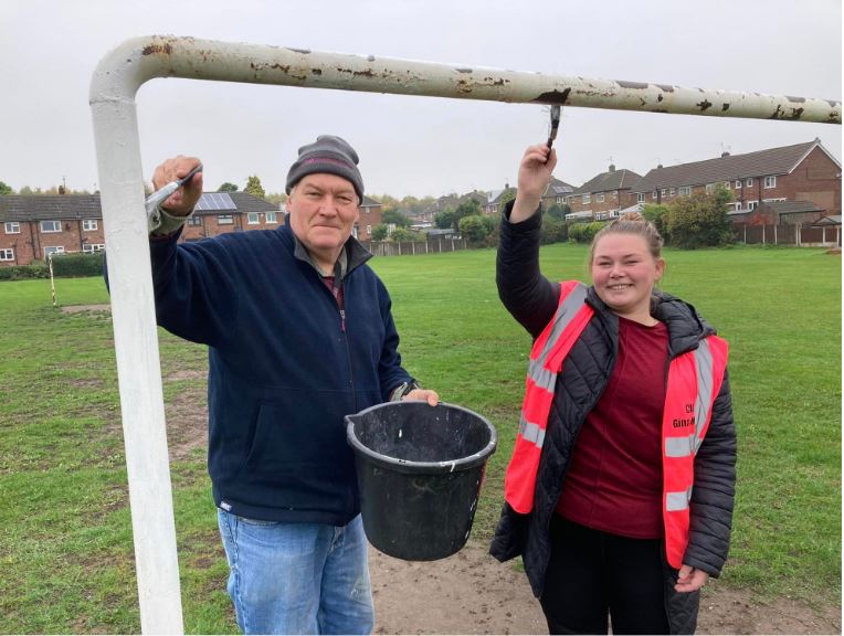 Cllr Wyatt and Cllr Monk painting the goalposts