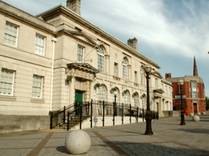 A town hall in sunny weather.