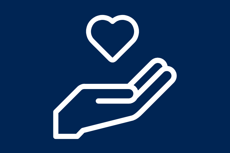 A hand holding a floating heart