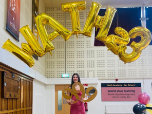 The image shows Holly McMaster who achieved ten grade 9’s at Wath Academy.