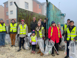Cllr Miro with litter pickers at the clean-up day
