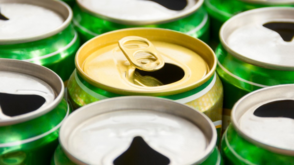 Group of open drinks cans
