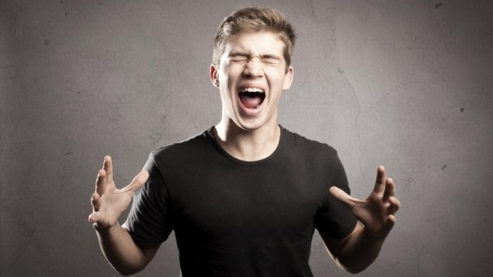 Man screaming in anger