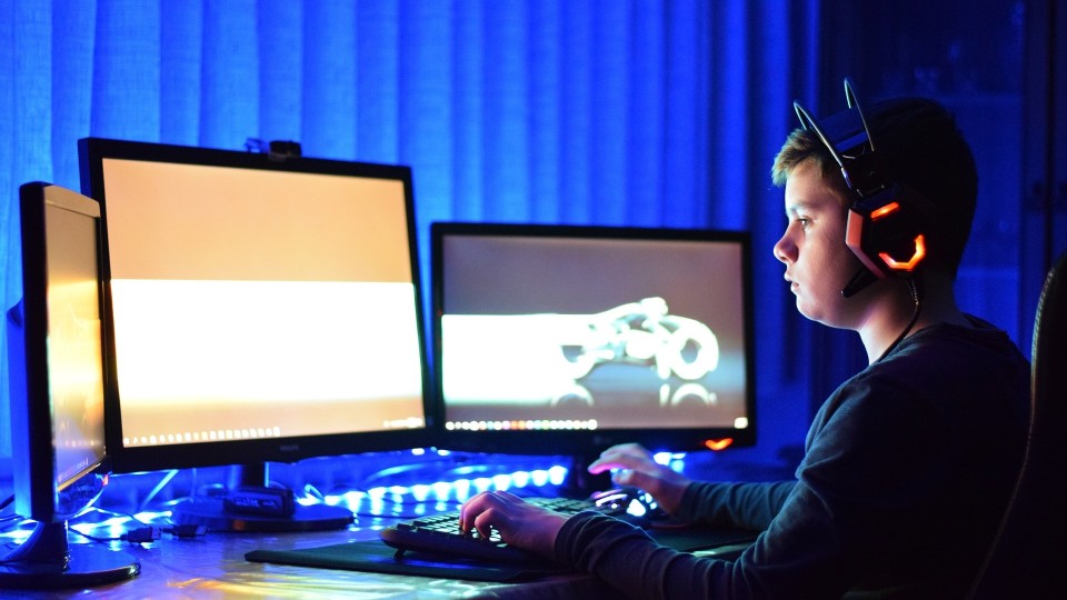 Child playing games on computer