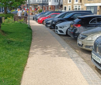 A new light beige footpath.