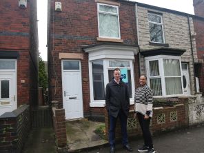 Leader of Rotherham Council, Cllr Chris Read pictured with Empty Homes Officer, Tania McGee outside a property that once stood empty and has now been refurbished and is occupied.