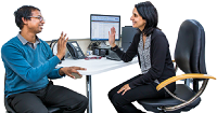 Two people at a desk