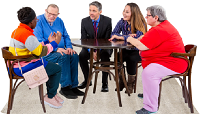 A group of people sat around a table