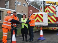 Cllr Hoddinott, Colin Knight and members of the Street Lighting Team with one of the new street lamp units.