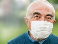 Older man wearing face mask