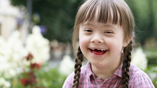Little girl with plaits smiling