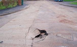 A road with a hole in it.