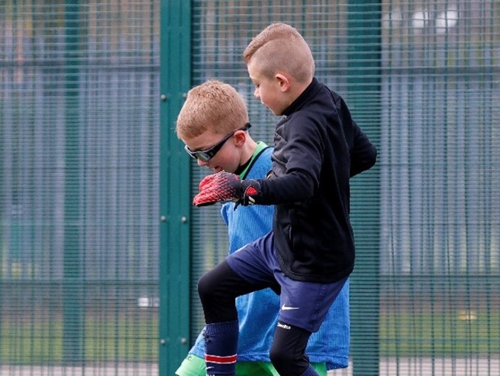 RUCST playing football at Parkgate Astro