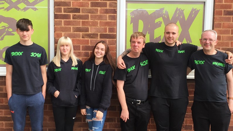 The Dexx staff group outside venue